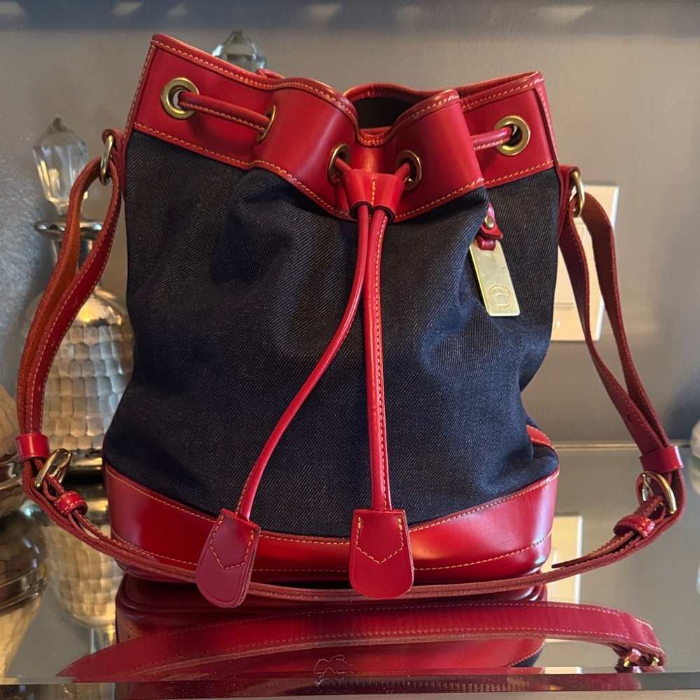 Dooney and Bourke Stylish Denim and Red Bucket Bag